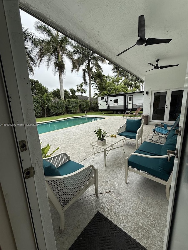 13135 SW 218th Ter, Miami, FL 33170 - view of patio featuring french doors and ceiling fan