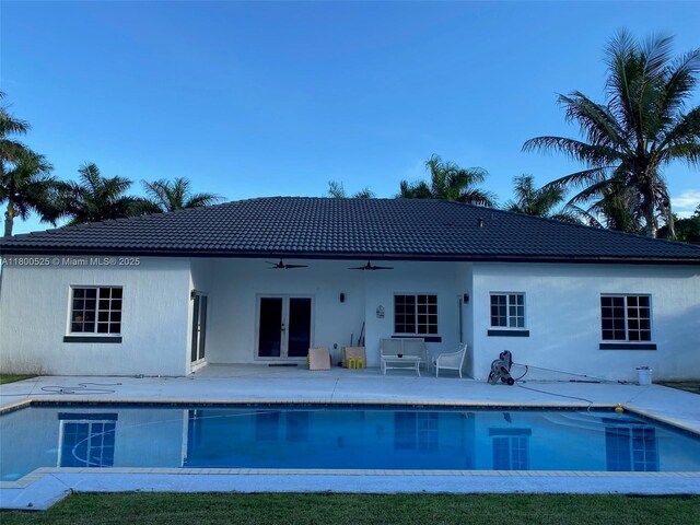 13135 SW 218th Ter, Miami, FL 33170 - swimming pool featuring french doors, ceiling fan, and a patio area