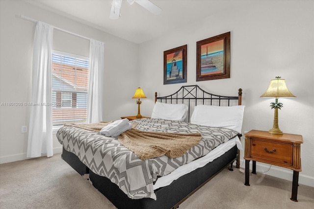 2950 Lucayan Harbour Cir Unit 107, Kissimmee, FL 34746 - bedroom with carpet flooring, baseboards, and ceiling fan