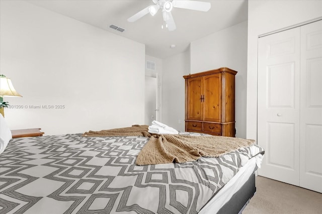2950 Lucayan Harbour Cir Unit 107, Kissimmee, FL 34746 - bedroom featuring a closet, vaulted ceiling, and ceiling fan