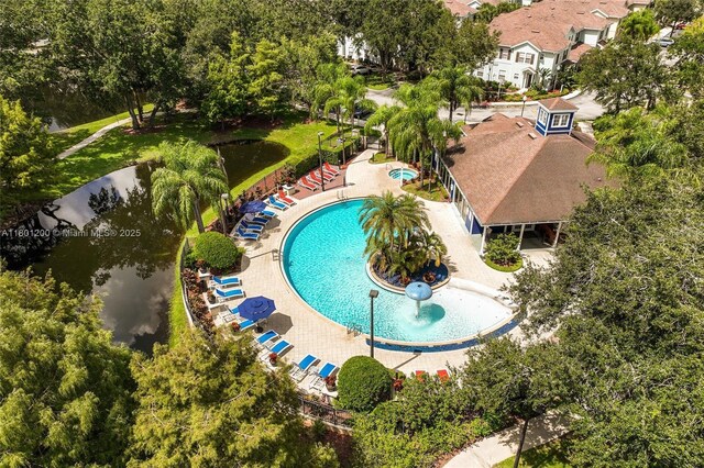 2950 Lucayan Harbour Cir Unit 107, Kissimmee, FL 34746 - aerial view of a pool and a nearby body of water