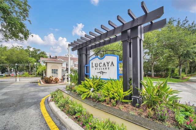 2950 Lucayan Harbour Cir Unit 107, Kissimmee, FL 34746 - community / neighborhood sign with a gate
