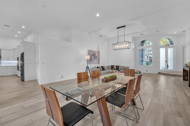 2623 Oakbrook Dr, Weston, FL 33332 - dining area with light wood-style floors and recessed lighting