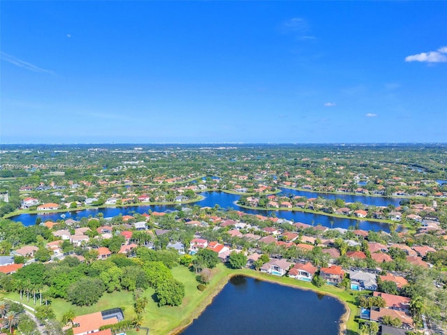 2623 Oakbrook Dr, Weston, FL 33332 - aerial view of property and surrounding area featuring a nearby body of water and nearby suburban area