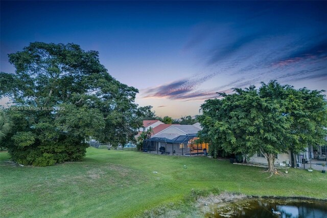 2623 Oakbrook Dr, Weston, FL 33332 - view of green lawn featuring a lanai