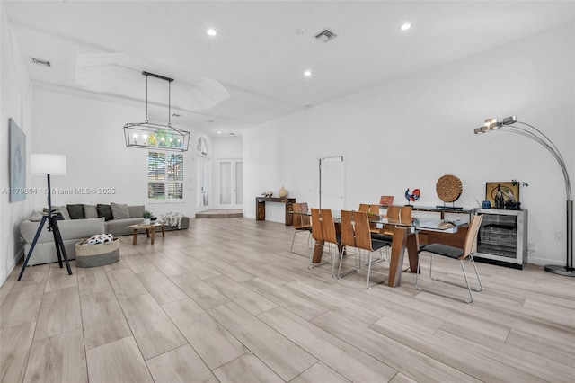 2623 Oakbrook Dr, Weston, FL 33332 - dining space with recessed lighting, light wood finished floors, a chandelier, and wine cooler