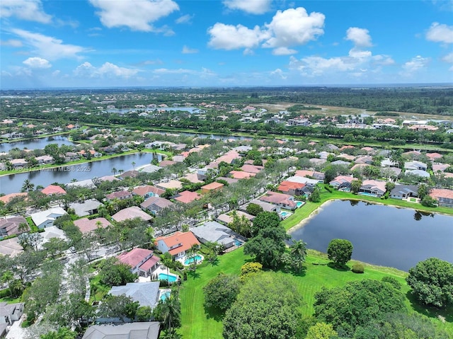 2623 Oakbrook Dr, Weston, FL 33332 - aerial perspective of suburban area with a nearby body of water