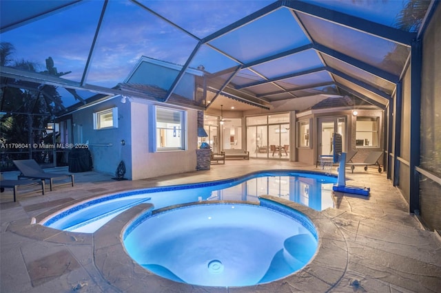 2623 Oakbrook Dr, Weston, FL 33332 - view of pool featuring a pool with connected hot tub, a patio, and a lanai