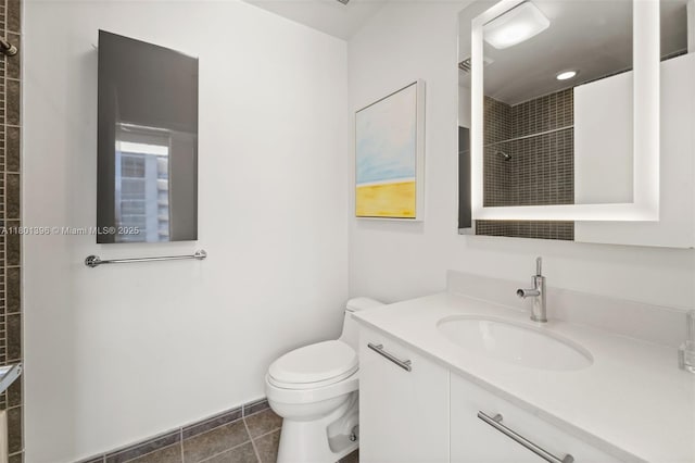 3470 E Coast Ave Unit H1909, Miami, FL 33137 - bathroom with toilet, a tile shower, vanity, and tile patterned flooring