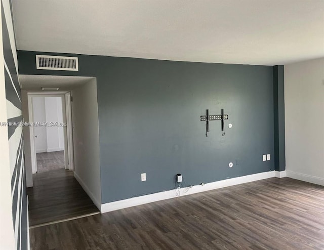 4164 Inverrary Dr Unit 301, Lauderhill, FL 33319 - unfurnished room featuring dark wood-style floors and baseboards