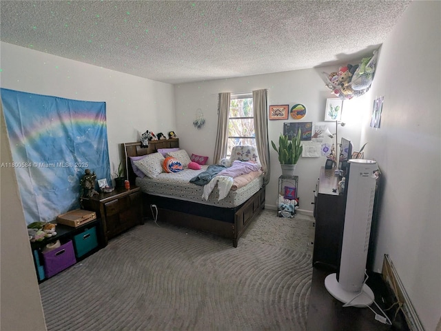 carpeted bedroom with a textured ceiling