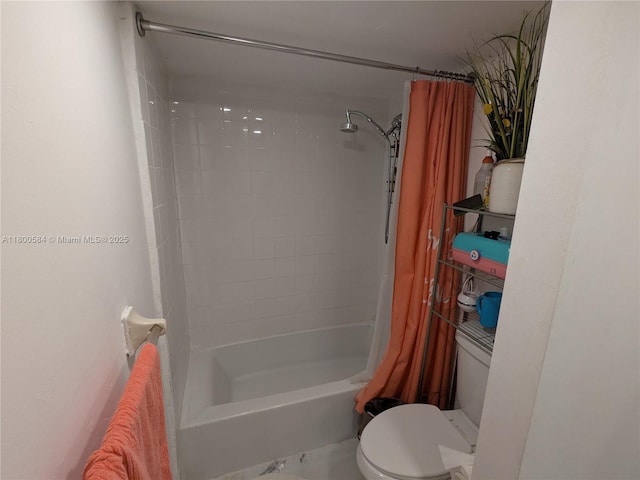 bathroom with toilet and shower / tub combo