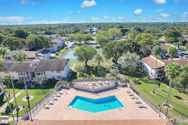aerial perspective of suburban area with a pool area