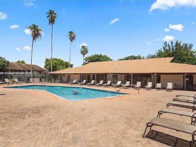 community pool with a patio