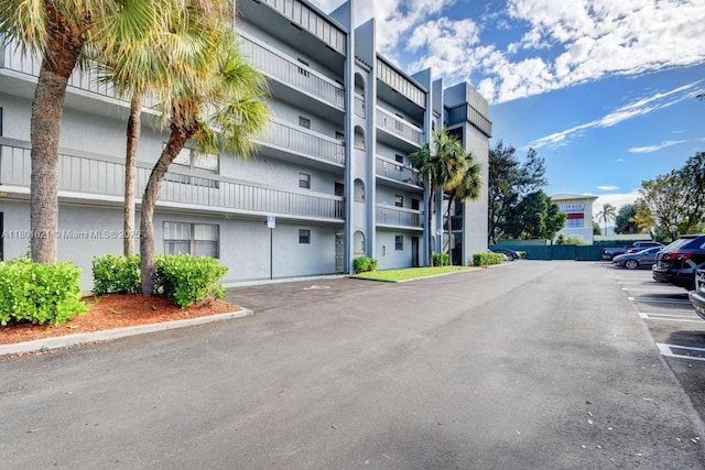 1850 N Congress Ave Unit 311, West Palm Beach, FL 33401 - view of apartment building / complex with uncovered parking