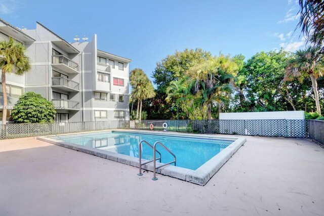 1850 N Congress Ave Unit 311, West Palm Beach, FL 33401 - community pool featuring fence and a patio area