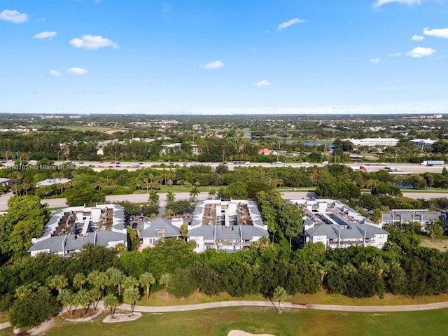 1850 N Congress Ave Unit 311, West Palm Beach, FL 33401 - aerial view of property and surrounding area featuring a tree filled landscape and nearby suburban area