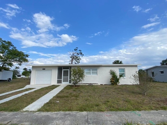 22011 Catherine Prt, Charlotte, FL 33952 - ranch-style house with stucco siding, an attached garage, driveway, and a front yard