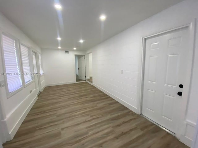 22011 Catherine Prt, Charlotte, FL 33952 - unfurnished room with wood finished floors, recessed lighting, and baseboards