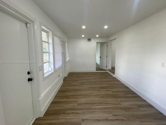 22011 Catherine Prt, Charlotte, FL 33952 - hall with wood finished floors, baseboards, and recessed lighting