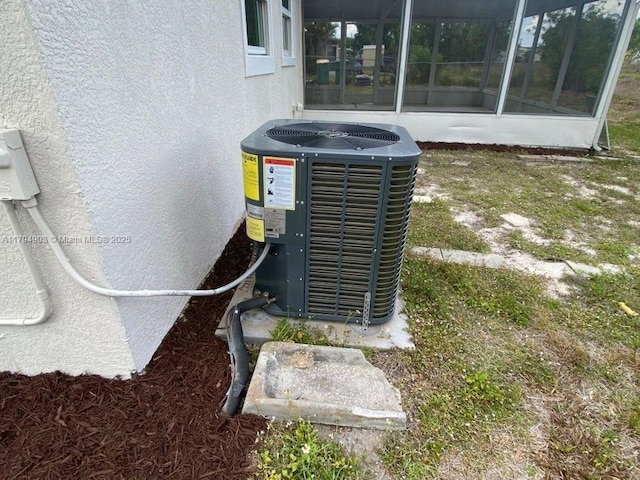 22011 Catherine Prt, Charlotte, FL 33952 - exterior view of cooling unit and stucco siding