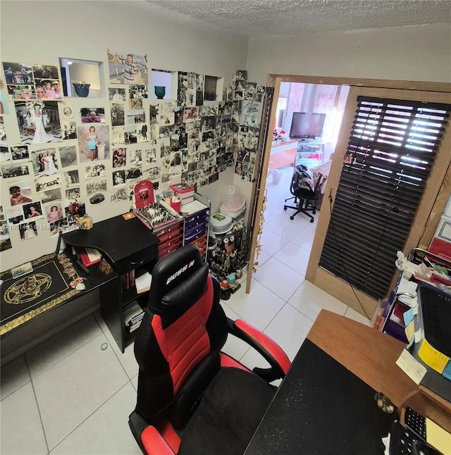 3800 S Ocean Dr Unit 818, Hollywood, FL 33019 - office area with a textured ceiling and tile patterned floors