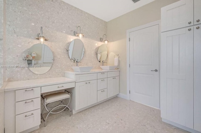 bathroom with double vanity
