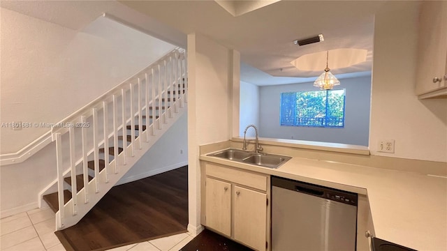 781 SW 148th Ave Unit 1513, Sunrise, FL 33325 - kitchen featuring dishwasher, a sink, light countertops, and tile patterned flooring