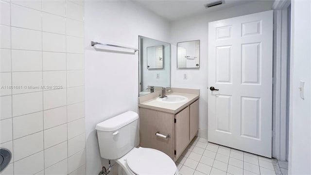 781 SW 148th Ave Unit 1513, Sunrise, FL 33325 - bathroom featuring tile patterned flooring, toilet, and vanity