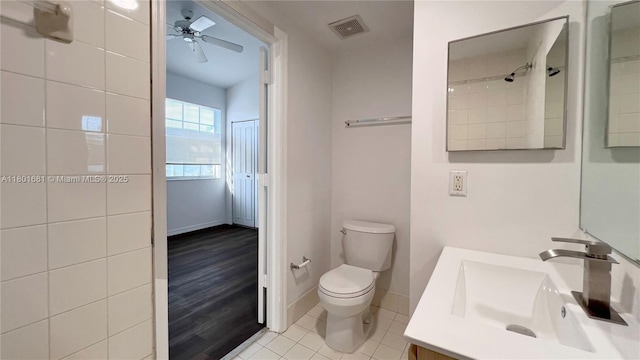 781 SW 148th Ave Unit 1513, Sunrise, FL 33325 - bathroom featuring toilet, a ceiling fan, vanity, tile patterned floors, and baseboards