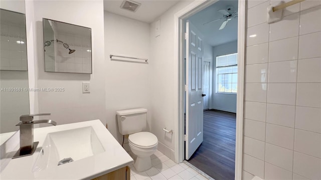 781 SW 148th Ave Unit 1513, Sunrise, FL 33325 - bathroom featuring a ceiling fan, toilet, tile patterned floors, and vanity