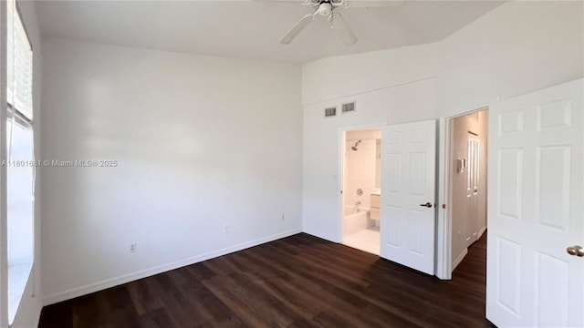 781 SW 148th Ave Unit 1513, Sunrise, FL 33325 - unfurnished bedroom featuring dark wood-style floors, baseboards, high vaulted ceiling, connected bathroom, and a ceiling fan