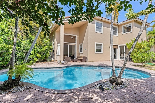 5832 NW 120th Ave, Coral Springs, FL 33076 - outdoor pool with outdoor lounge area, a patio area, and a ceiling fan