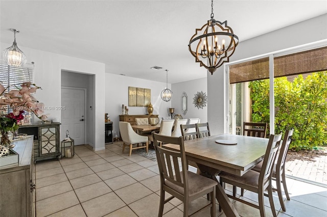 5832 NW 120th Ave, Coral Springs, FL 33076 - dining space featuring a chandelier and light tile patterned flooring