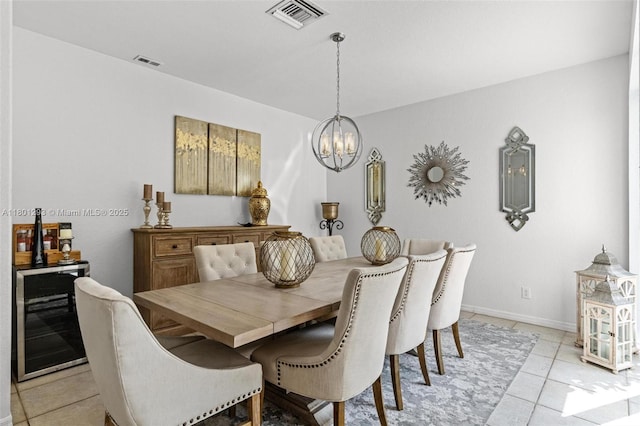 5832 NW 120th Ave, Coral Springs, FL 33076 - dining area with wine cooler, a chandelier, light tile patterned floors, and baseboards