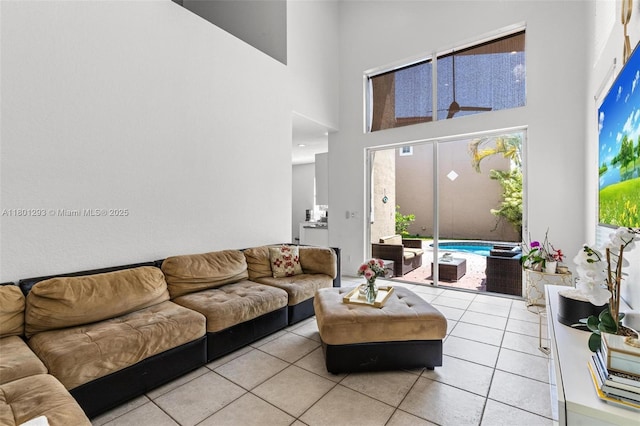 5832 NW 120th Ave, Coral Springs, FL 33076 - tiled living area with a high ceiling