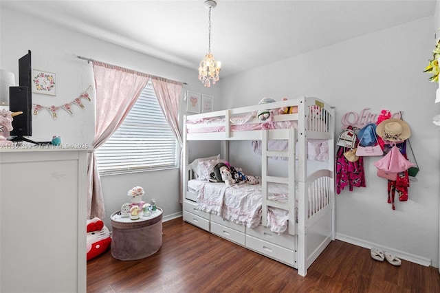 5832 NW 120th Ave, Coral Springs, FL 33076 - bedroom with wood finished floors, a chandelier, and baseboards
