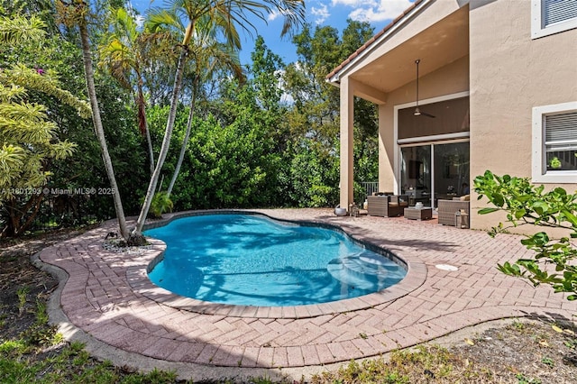 5832 NW 120th Ave, Coral Springs, FL 33076 - swimming pool with a patio, ceiling fan, and an outdoor hangout area