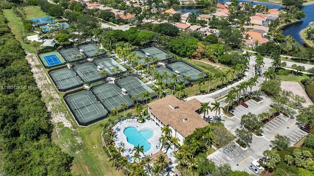 5832 NW 120th Ave, Coral Springs, FL 33076 - aerial view of property's location with a pool area and a nearby body of water