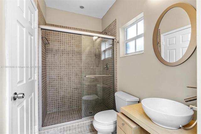 782 Lake Blvd, Weston, FL 33326 - bathroom featuring a shower stall, toilet, vanity, and tile patterned floors