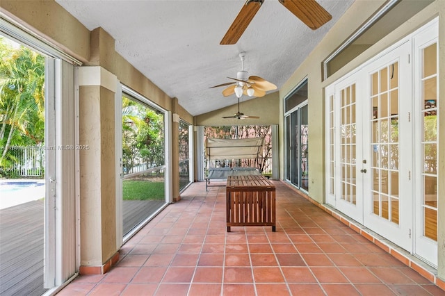 782 Lake Blvd, Weston, FL 33326 - unfurnished sunroom with french doors, ceiling fan, vaulted ceiling, and healthy amount of natural light