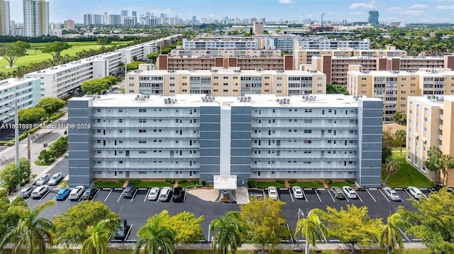 619 NE 14th Ave Unit 106, Hallandale Beach, FL 33009 - bird's eye view of a skyline view and apartment complex