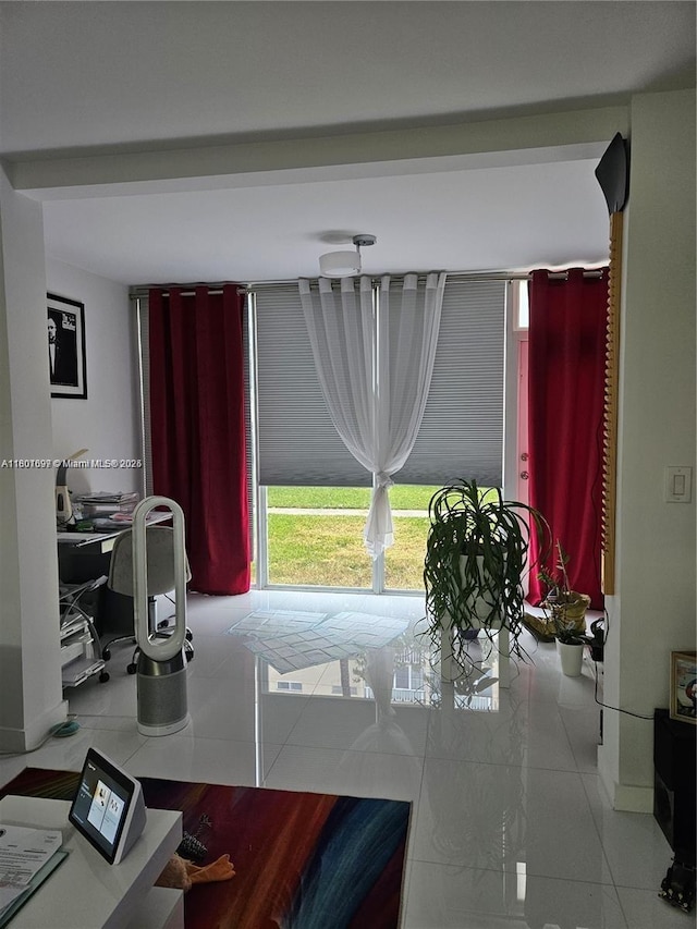 619 NE 14th Ave Unit 106, Hallandale Beach, FL 33009 - tiled dining area with a desk