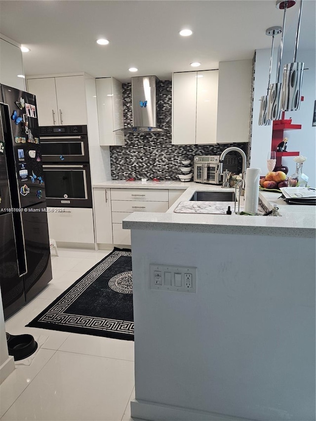 619 NE 14th Ave Unit 106, Hallandale Beach, FL 33009 - kitchen with wall chimney exhaust hood, white cabinetry, tasteful backsplash, black appliances, and recessed lighting