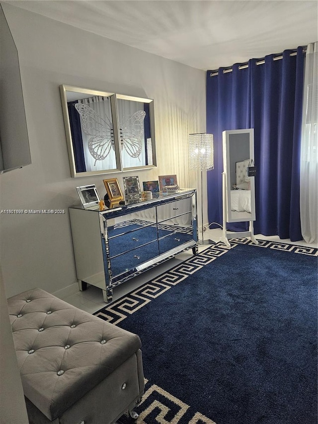 619 NE 14th Ave Unit 106, Hallandale Beach, FL 33009 - bedroom featuring baseboards