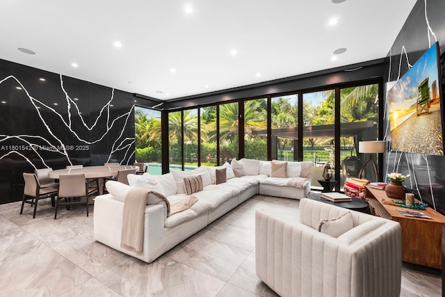 521 Holiday Dr, Hallandale Beach, FL 33009 - living area with plenty of natural light, recessed lighting, and marble tiled floors