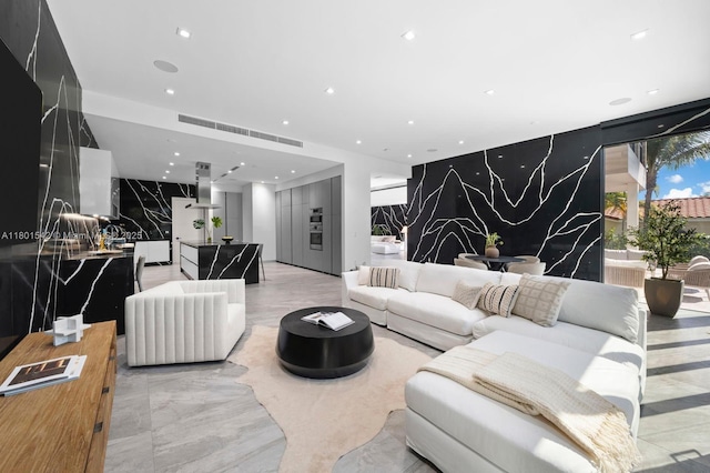 521 Holiday Dr, Hallandale Beach, FL 33009 - living area featuring light marble finish floors and recessed lighting