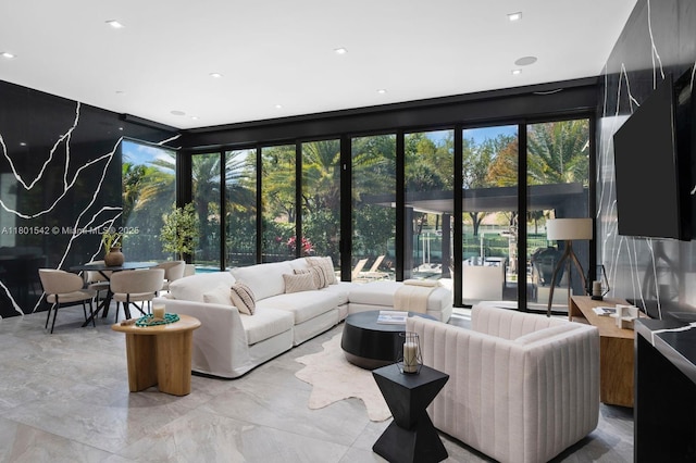 521 Holiday Dr, Hallandale Beach, FL 33009 - living area with light marble finish floors and recessed lighting