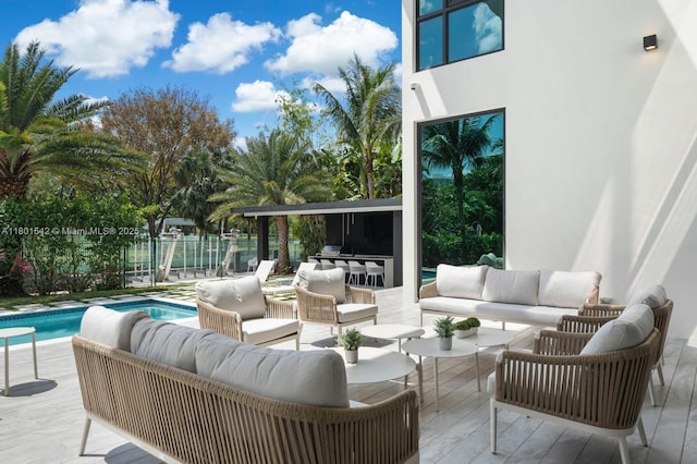 521 Holiday Dr, Hallandale Beach, FL 33009 - view of patio featuring an outdoor hangout area and an outdoor pool