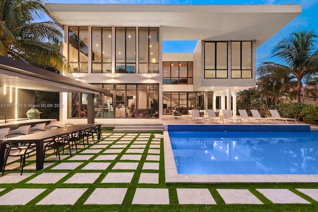 521 Holiday Dr, Hallandale Beach, FL 33009 - swimming pool with a patio area